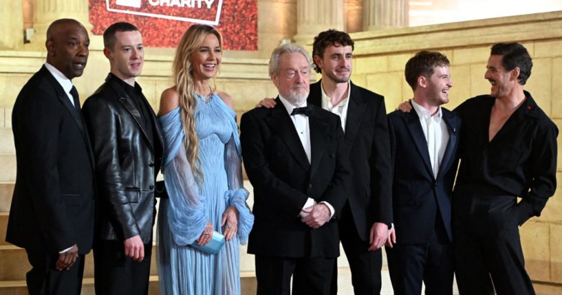 From left to right, Denzel Washington, Joseph Quinn, Connie Nielsen, Ridley Scott, Paul Mescal, Fred Hechinger, and Pedro Pascal pose on the red carpet upon arrival for the Royal film performance and World premiere of the film "Gladiator II" in London, England, on Nov. 13.