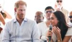 Prince Harry, left, and Meghan, Duchess of Sussex, right, visit the Unidad Recreativa El Vallado in Cali, Colombia, on Aug. 18.