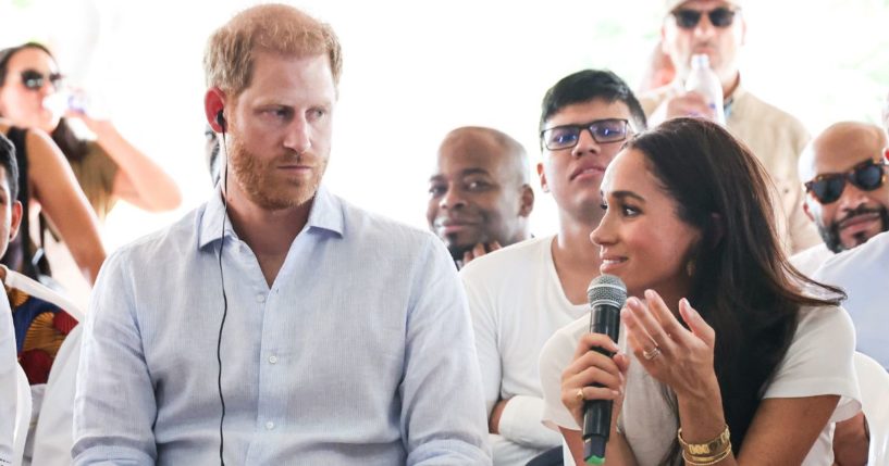 Prince Harry, left, and Meghan, Duchess of Sussex, right, visit the Unidad Recreativa El Vallado in Cali, Colombia, on Aug. 18.