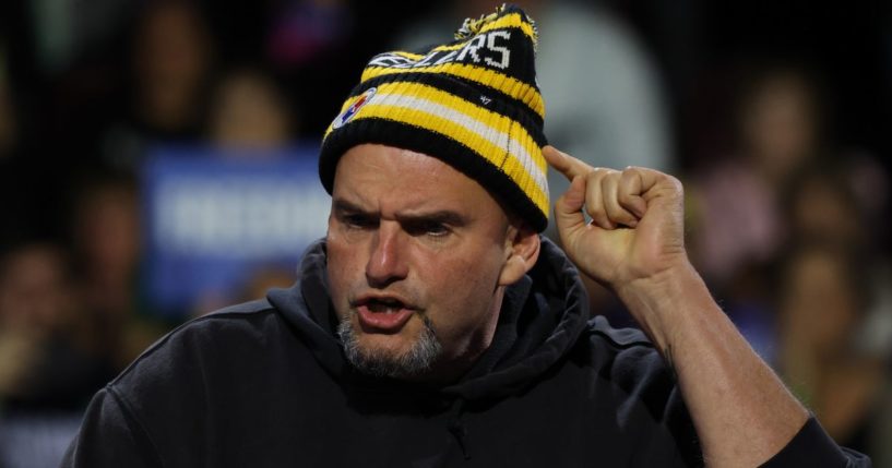 Sen. John Fetterman speaks at a campaign rally for Vice President Kamala Harris in Erie, Pennsylvania, on Oct. 14.