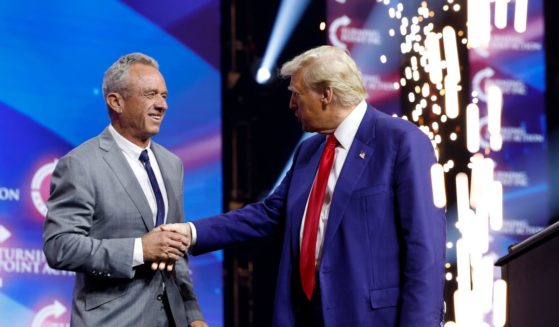 President-elect Donald Trump shakes the hand of Robert F. Kennedy Jr. at a Turning Point even in Duluth, Georgia, on Oct. 23.