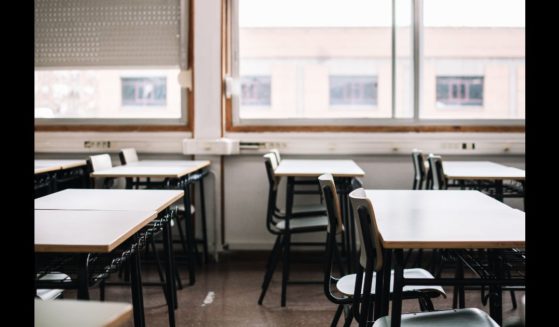 A stock photograph of an empty classroom.