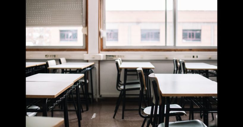 A stock photograph of an empty classroom.