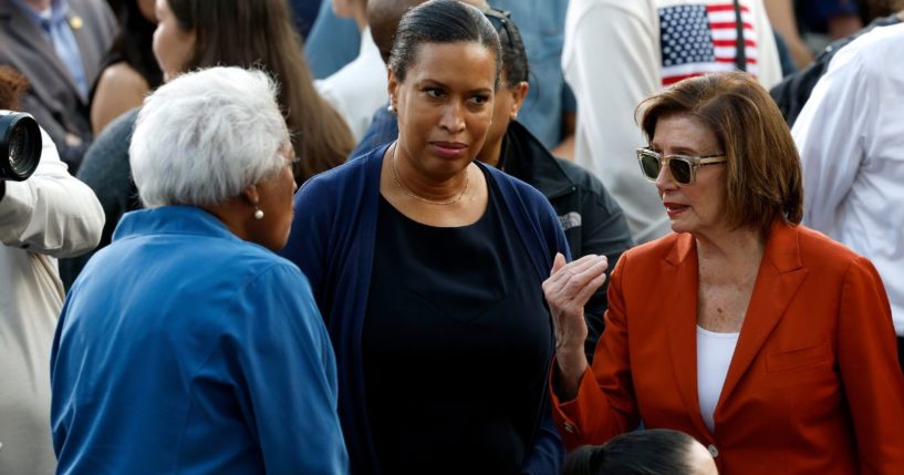 Rep. Nancy Pelosi, right, speaks with Washington D.C. Mayor Muriel Bowser, center, and Donna Brazile, left, before Vice President Kamala Harris' concession speech at Howard University in Washington, D.C., on Wednesday.