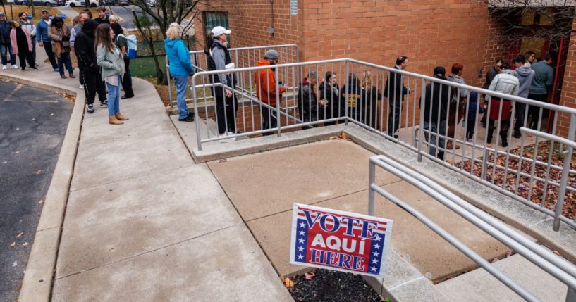 Voters line up outside of a polling station at Donegan Elementary School in Bethlehem, Pennsylvania, on Tuesday.