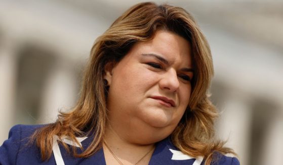 U.S. Delegate Jenniffer Gonzalez-Colon (R-PR) listens as Rep. Veronica Escobar (D-TX) listens as Rep. Maria Salazar (R-FL) speaks during a press conference on immigration outside the U.S. Capitol Building on May 23, 2023 in Washington, DC.