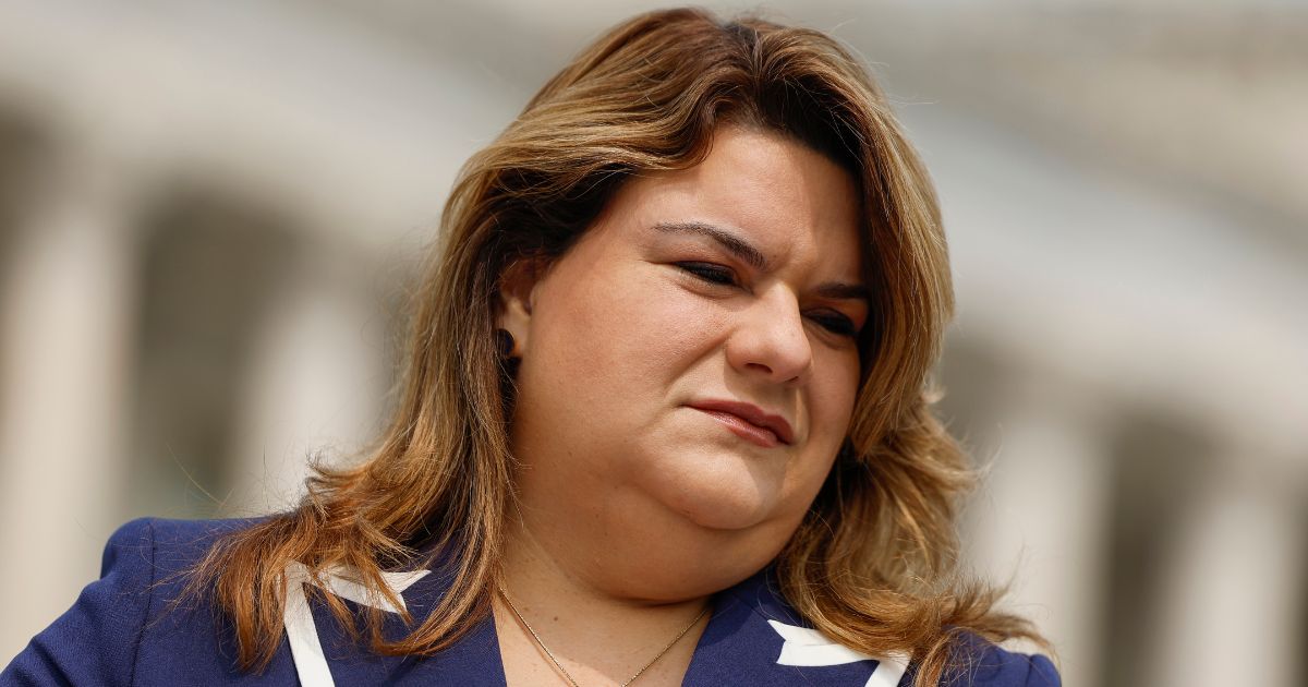 U.S. Delegate Jenniffer Gonzalez-Colon (R-PR) listens as Rep. Veronica Escobar (D-TX) listens as Rep. Maria Salazar (R-FL) speaks during a press conference on immigration outside the U.S. Capitol Building on May 23, 2023 in Washington, DC.