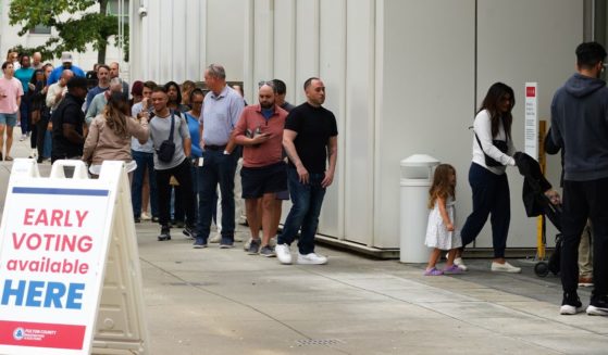 Voters head into a polling location to cast their ballots on the last day of early voting for the 2024 election on November 1, 2024 in Atlanta, Georgia. Georgia has had a record turn out for early voting with nearly 50% of active voters in the state voting early