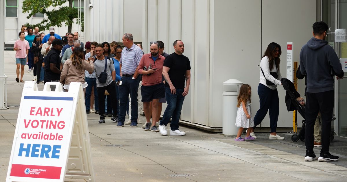 Voters head into a polling location to cast their ballots on the last day of early voting for the 2024 election on November 1, 2024 in Atlanta, Georgia. Georgia has had a record turn out for early voting with nearly 50% of active voters in the state voting early