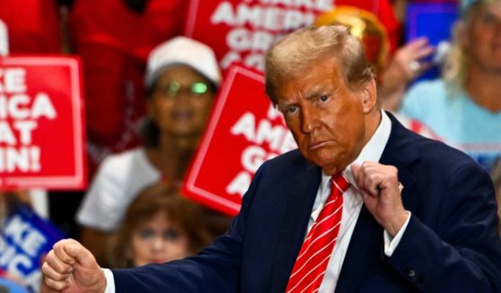 Former US President and Republican presidential candidate Donald Trump dances as he leaves a campaign rally in Rocky Mount, North Carolina, on October 30, 2024.