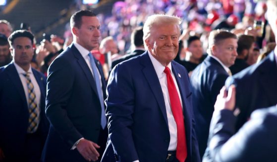 Surrounded by U.S. Secret Service agents, Republican presidential nominee, former President Donald Trump leaves the the Santander Arena following a campaign rally on November 04, 2024 in Reading, Pennsylvania.