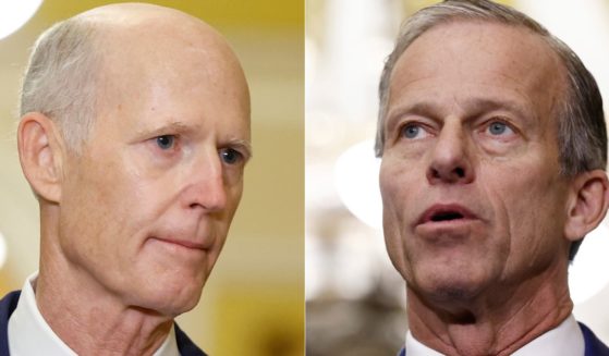 Sen. John Thune, right, was elected as the Senate majority leader by Republicans on Wednesday, defeating Sens. Rick Scott, left, and John Cornyn.