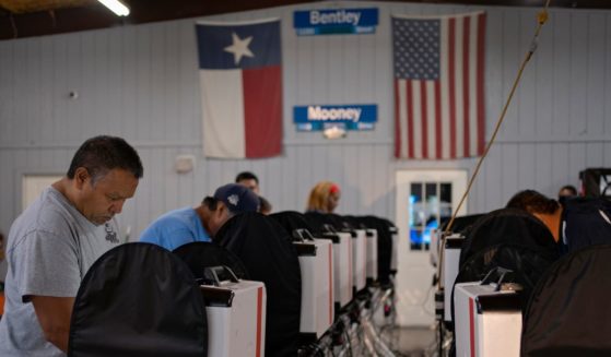 People vote at the Westfield Road Volunteer Fire Department Station 2 in Houston, Texas, on Tuesday.