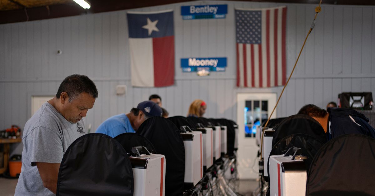 People vote at the Westfield Road Volunteer Fire Department Station 2 in Houston, Texas, on Tuesday.