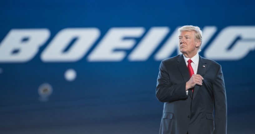 Then-President Donald Trump waits to address the crowd during the debut event for the Dreamliner 787-10 at Boeing's South Carolina facilities in North Charleston, South Carolina, on Feb. 17, 2017.