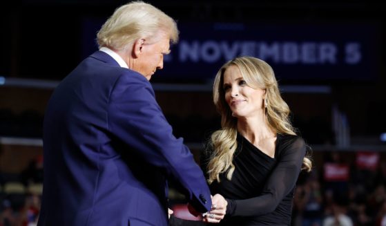 Former President Donald Trump greets media personality Megyn Kelly at his campaign rally Monday in Pittsburgh, Pennsylvania.