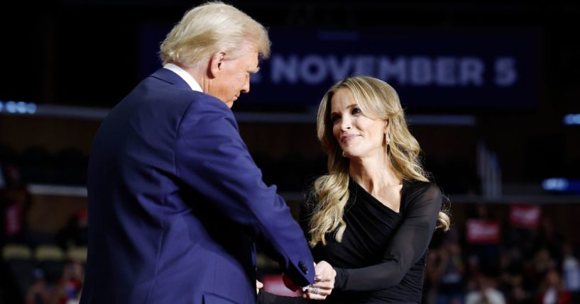 Former President Donald Trump greets media personality Megyn Kelly at his campaign rally Monday in Pittsburgh, Pennsylvania.