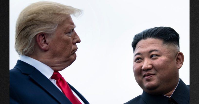 Then-President Donald Trump and North Korea's leader Kim Jong-un talk before a meeting in the Demilitarized Zone on June 30, 2019, in Panmunjom, Korea.