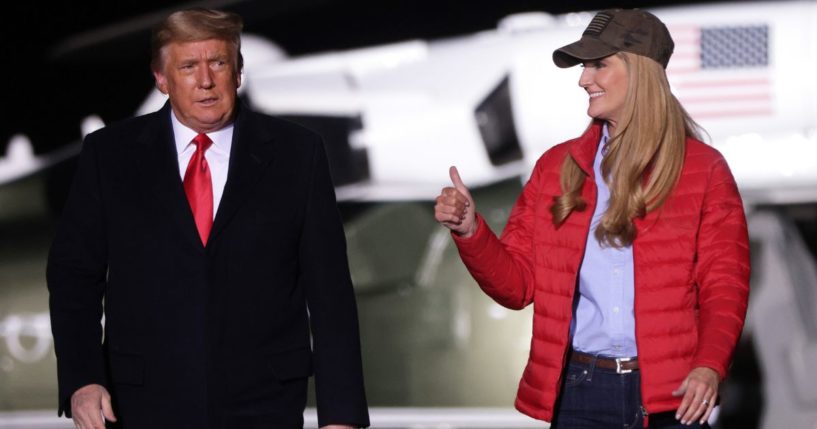 Then-President Donald Trump arrives with then-Sen. Kelly Loeffler, a Georgia Republican, at a campaign rally in Dalton, Georgia, in a file photo from Jan. 4, 2021.