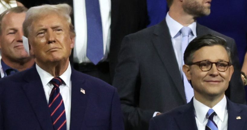 Former President Donald Trump stands with Speaker of the House Mike Johnson of Louisiana at the Republican National Convention on July 17 in Milwaukee, Wisconsin.