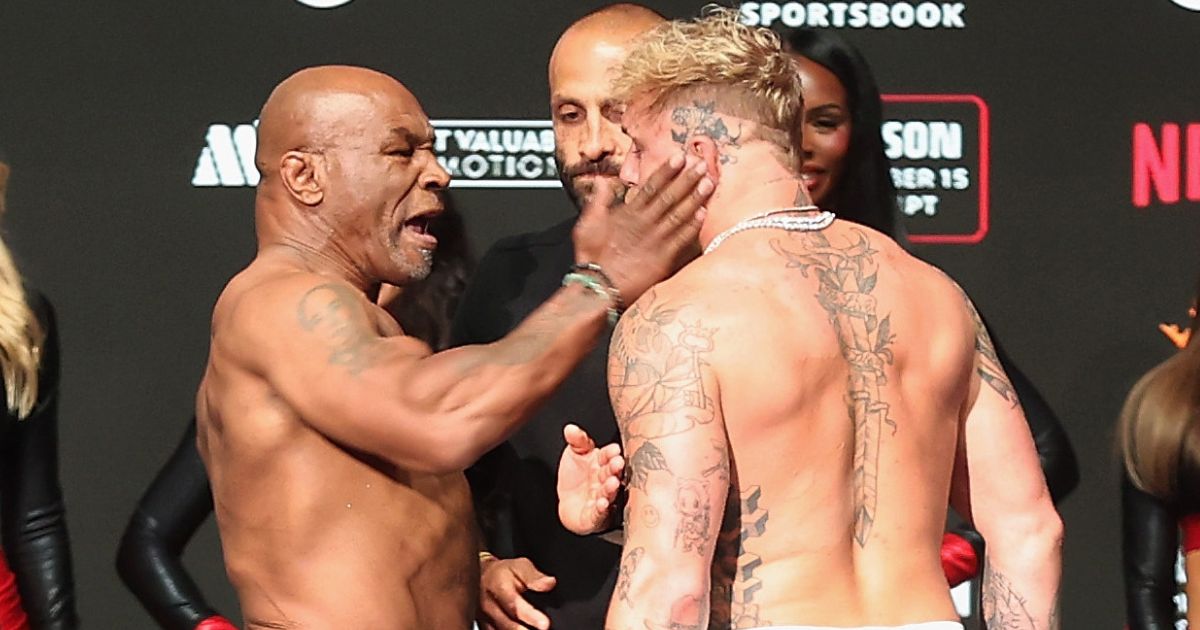 Mike Tyson Strikes Jake Paul at Weigh-In, Claims His Younger Opponent Made First Contact