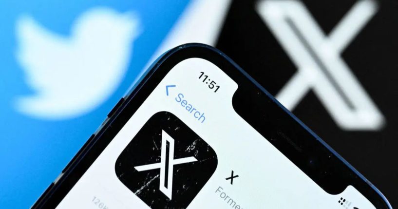 The logo of X, formerly Twitter, is displayed on a smartphone screen in Frankfurt am Main, Germany, on Nov. 17, 2023.