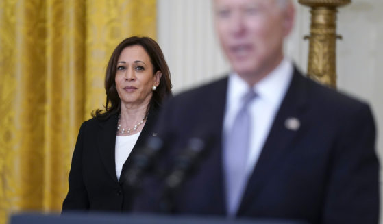 Vice President Kamala Harris listens as President Joe Biden speaks in the East Room of the White House in Washington, D.C., on May 17, 2021.