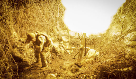 Servicemen of the 24th Mechanised Brigade fire 120mm mortar towards Russian positions near Chasiv Yar, Ukraine, on Tuesday.