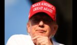 Former U.S. President Donald Trump looks on at the 18th green during day three of the LIV Golf Invitational - Miami at Trump National Doral Miami on April 7, 2024 in Doral, Florida.