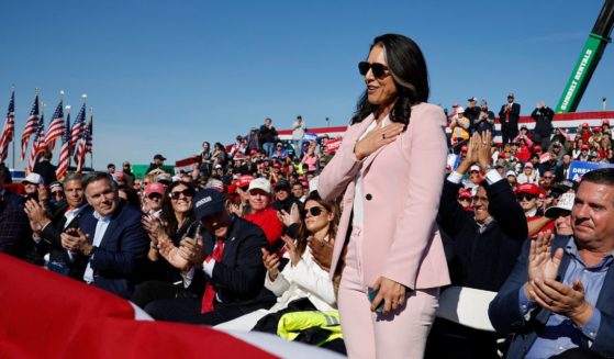 Former Rep. Tulsi Gabbard (R-HI) is introduced by U.S. President-elect Donald Trump during a campaign rally at Lancaster Airport on November 3, 2024 in Lititz, Pennsylvania.