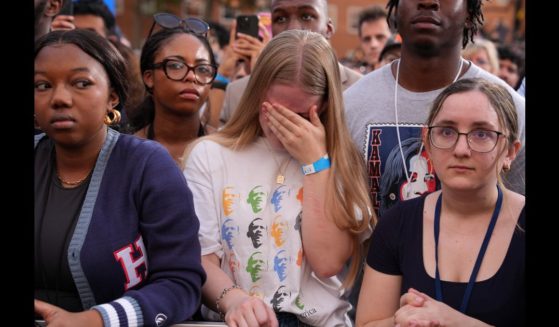 Supporters react as Democratic presidential nominee, U.S. Vice President Kamala Harris concedes the election during a speech at Howard University on November 6, 2024 in Washington, DC.