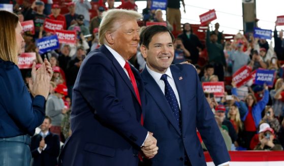 U.S. President-elect Donald Trump appears on stage with U.S. Sen. Marco Rubio (R-FL) (R) and Arkansas Gov. Sarah Huckabee Sanders during a campaign rally at the J.S. Dorton Arena on November 4, 2024 in Raleigh, North Carolina.