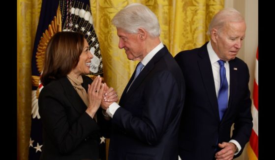 (L-R) Vice President Kamala Harris, former President Bill Clinton and U.S. President Joe Biden mark the 30th anniversary of the Family and Medical Leave Act during an event in the East Room of the White House on February 2, 2023 in Washington, DC.