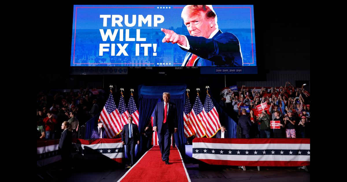 Republican presidential nominee, former U.S. President Donald Trump, takes the stage for his last rally of the election year at Van Andel Arena on November 5, 2024 in Grand Rapids, Michigan.