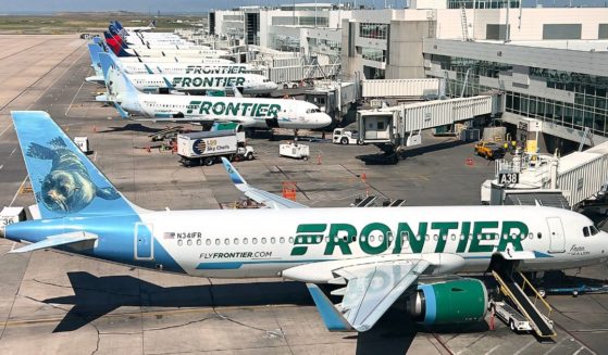 Frontier Airlines planes are parked at gates in Denver International Airport in Denver, Colorado, on Aug. 5, 2023.