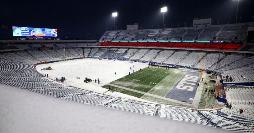 A general view of Highmark Stadium as workers remove a tarp from the field prior to an NFL football game between the Buffalo Bills and the San Francisco 49ers on December 1, 2024 in Orchard Park, New York.