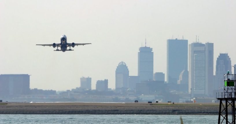 An airplane departs Logan International Airport in Boston, Massachusetts.