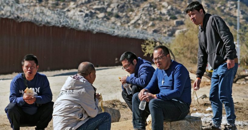 Chinese illegal immigrants attempting to cross into the U.S. from Mexico are detained by U.S. Customs and Border Protection at the border in Jacumba, California, on Nov. 11, 2023.