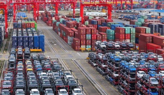 Cars are stacked ready to be loaded onto a ship for export at the port in Taicang, in China's eastern Jiangsu province on July 16.