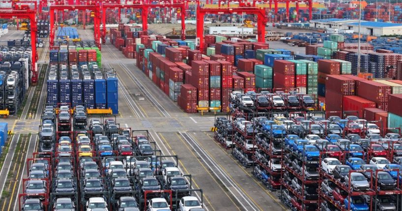 Cars are stacked ready to be loaded onto a ship for export at the port in Taicang, in China's eastern Jiangsu province on July 16.