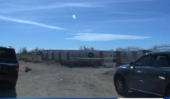 Police tape is pictured at the home of Diego Leyva, a 16-year-old New Mexico youth who called 911 to report that he had killed his family on Saturday.