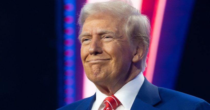 President-elect Donald Trump smiles during Turning Point USA's AmericaFest in Phoenix, Arizona, on Sunday.