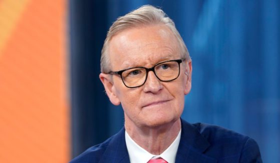 Fox anchor Steve Doocy interviews Virginia Gov. Glenn Youngkin during a visit on "Fox & Friends" at Fox News Channel Studios on October 10, 2024 in New York City.