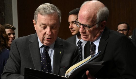 Senate Judiciary Committee chairman Dick Durbin, left, speaks with Sen. Peter Welch as they return after a break during the Senate Judiciary Committee hearing "Big Tech and the Online Child Sexual Exploitation Crisis" in Washington, D.C., on Jan. 31.