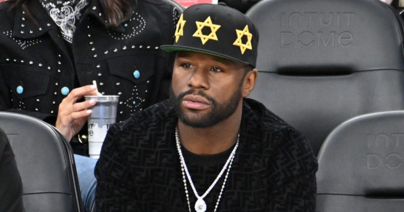 Floyd Mayweather Jr. attends a basketball game between the Los Angeles Clippers and the Utah Jazz in Inglewood, California, on Nov. 17.