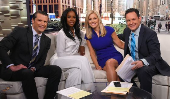 Then-"Fox and Friends" co-host Pete Hegseth, left, interviews Kelly Rowland, second from left, with Ainsley Earhardt, second from right, and Brian Kilmeade, right, in New York City on March 21, 2016.