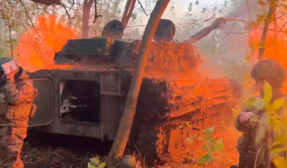 A Russian Gvozdika 120mm Howitzer fires toward Ukrainian positions at a border area of the Russia's Kursk region in a file photo from October.