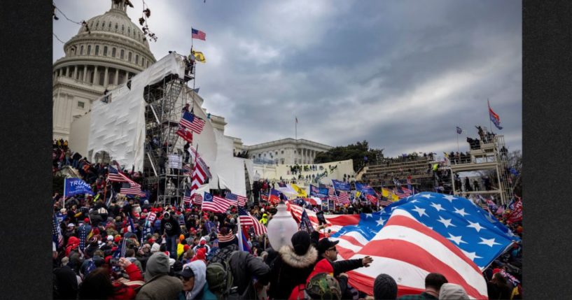 Protesters clash with police and security forces as people try to storm the U.S.Capitol on Jan. 6, 2021, in Washington, D.C. Demonstrators breached security and entered the Capitol as Congress debated the 2020 presidential election electoral vote certification. Now the FBI has admitted it had more than two dozen confidential human sources at the event.