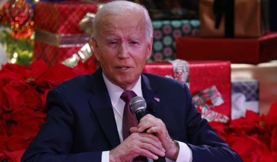 President Joe Biden speaks during a holiday visit to patients and families at Children's National Hospital in Washington, D.C., on Friday.