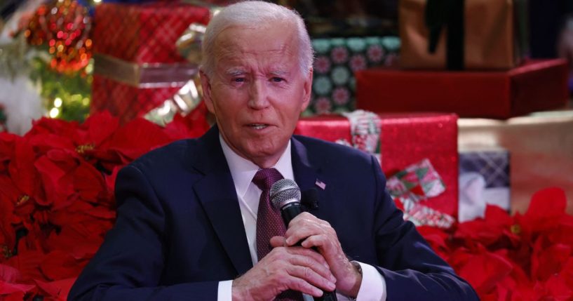 President Joe Biden speaks during a holiday visit to patients and families at Children's National Hospital in Washington, D.C., on Friday.